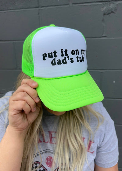 Put It On My Dad's Tab Trucker Hat