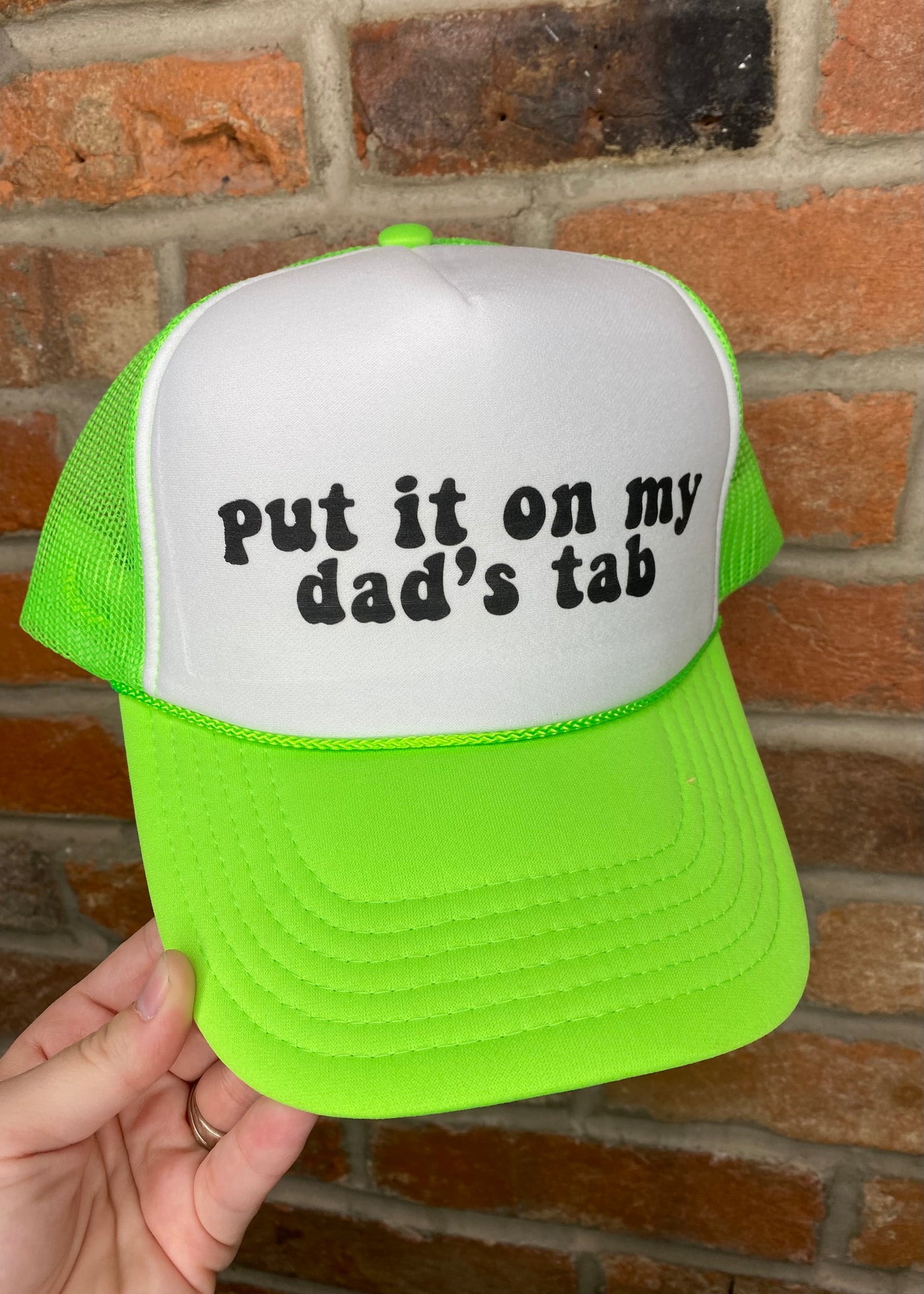 Put It On My Dad's Tab Trucker Hat